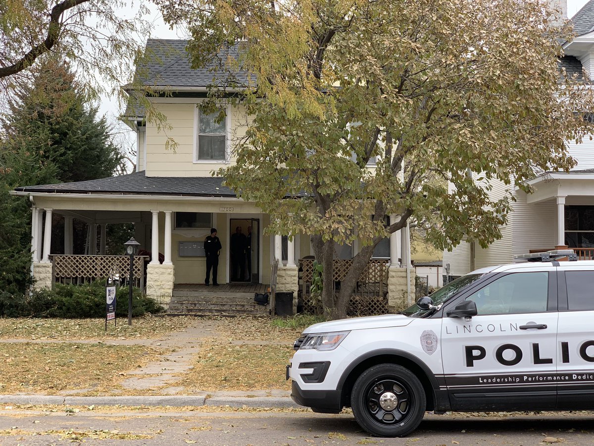 Police investigators continue to process the scene of the shooting at 17th & B