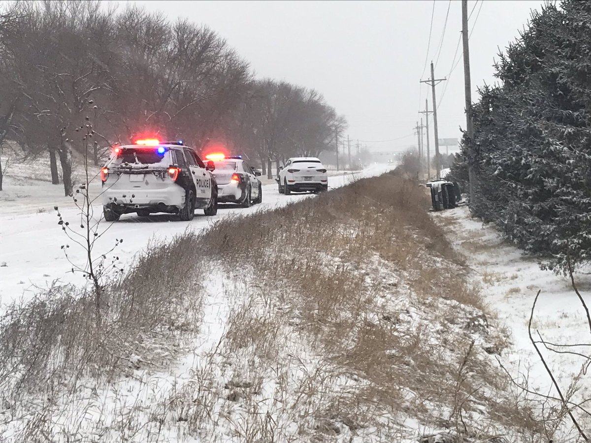 Two vehicle crash near 120th and Fort. Police tell there are minor injuries. One vehicle is rolled over on its side in the ditch. 