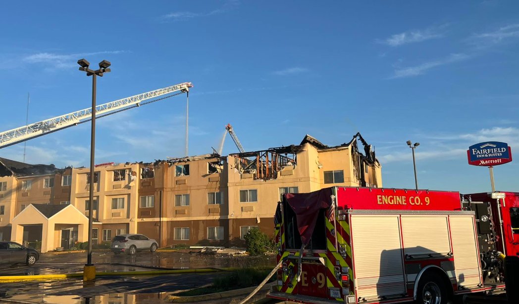 A Marriott hotel was declared a total loss after an improperly discarded cigarette ignited a fire. Fire officials say the flames caused the third and second floor of the Marriott to collapse into the first