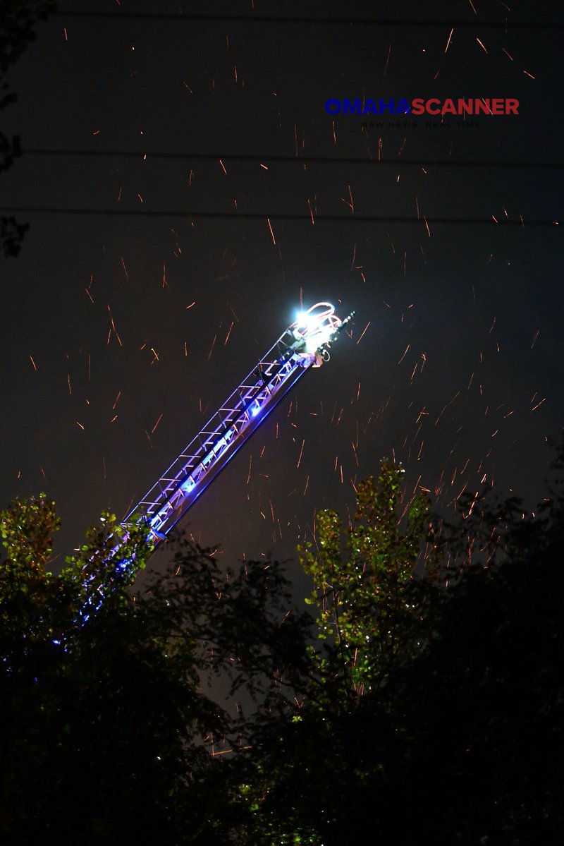 Omaha Fire Department is battling a large brush fire near Carter Lake Shore Drive and Locust Street. They were first called to the area at 7:05 p.m. No immediate injuries have been reported at this time